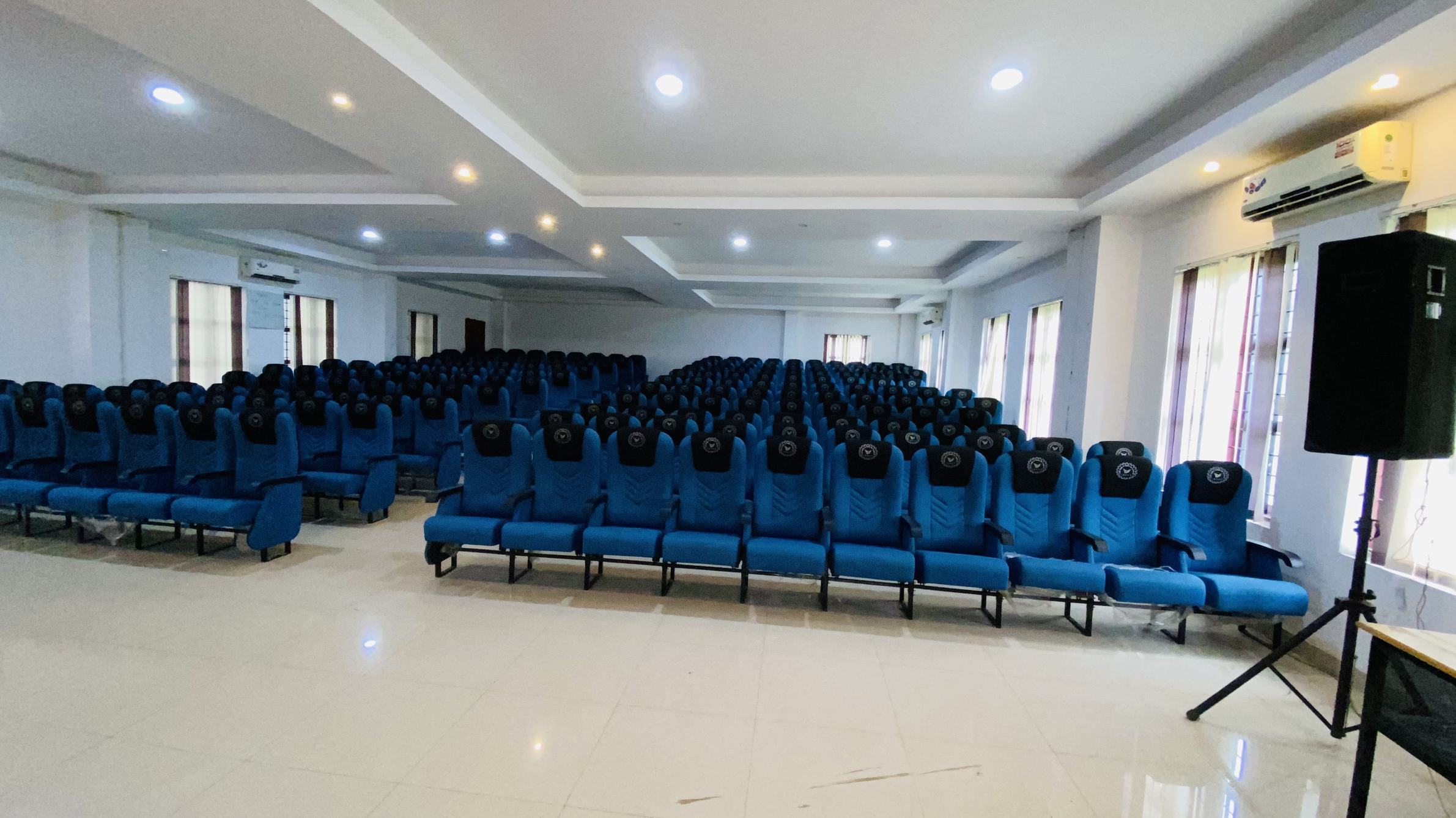 Ilahia Polytechnic College seminar hall with blue seating